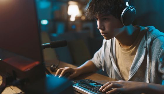 teenager-wearing-headphones-and-playing-online-vid-2022-01-19-00-21-34-utc-pvsn1lkw4ld53snlwt0gzd5g2q8vgkw56ssbp4xd34